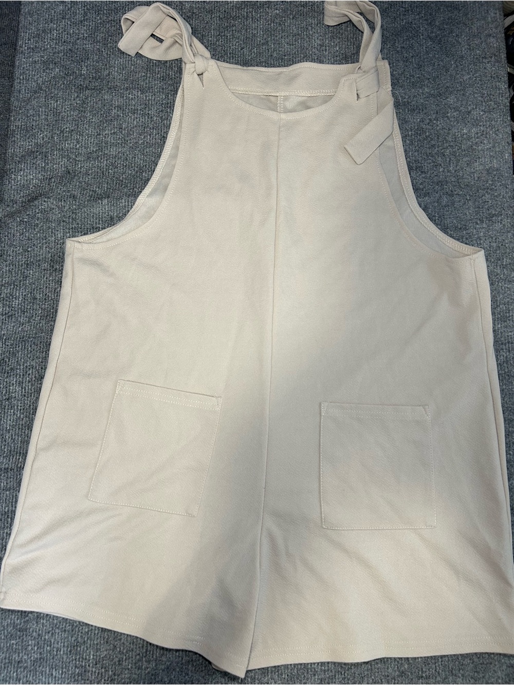 Tie-Shoulder Cream Romper with Front Pockets